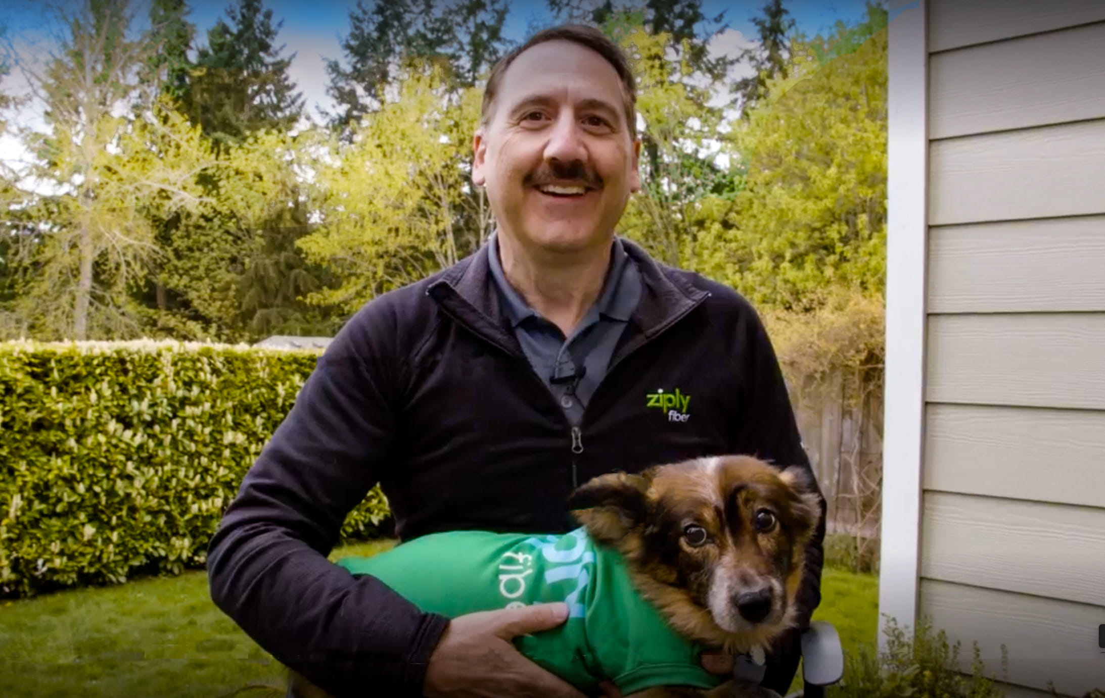 Ziply Fiber CEO with Ziply Fiber mascot ZoZo