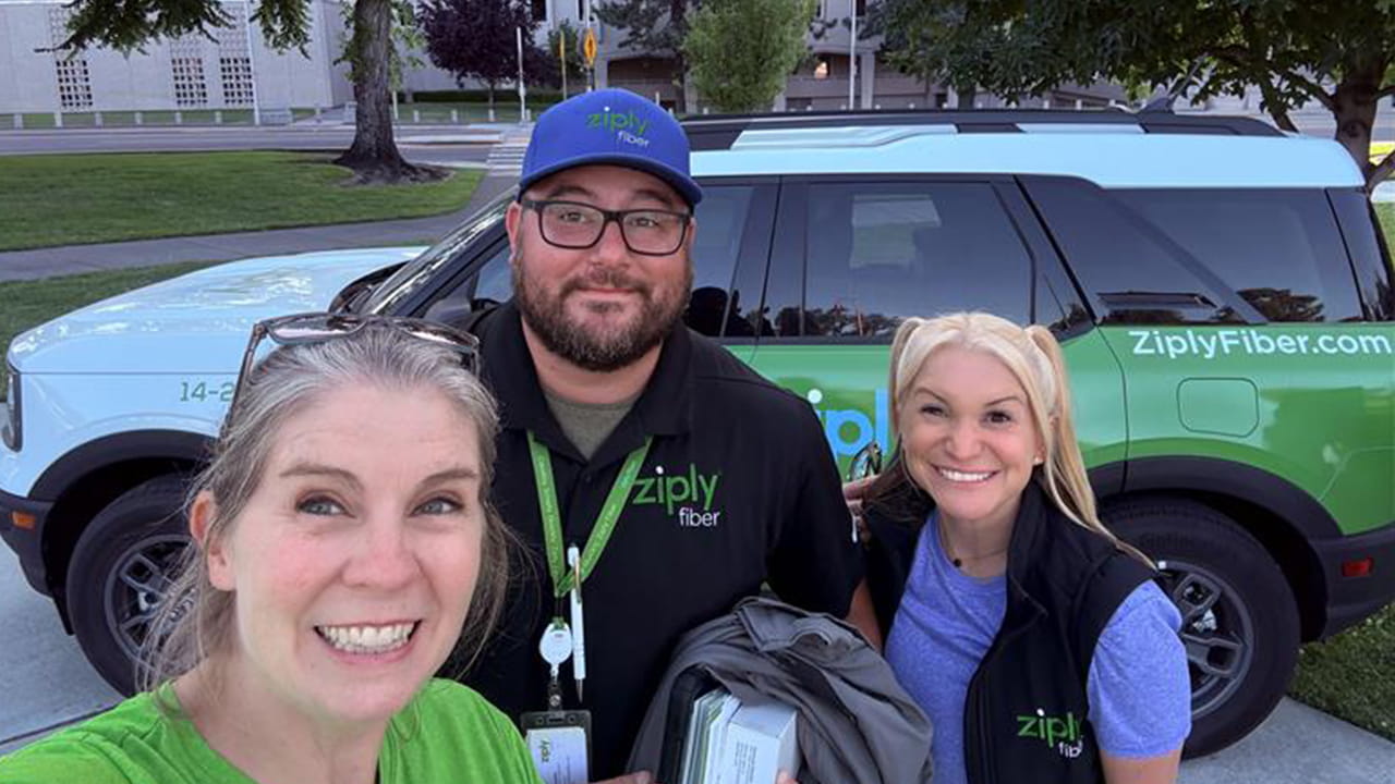 Marketing team in the field bringing high-speed internet