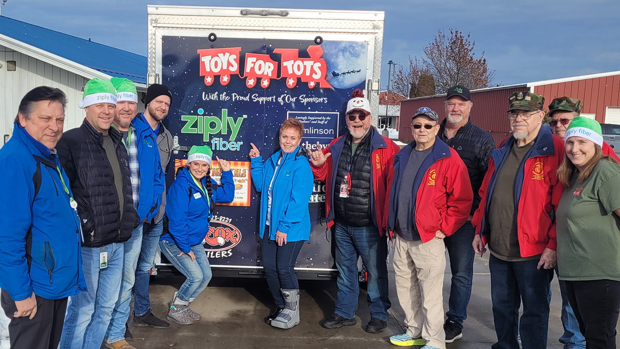 Ziply Fiber team with Toys for Tots trucks