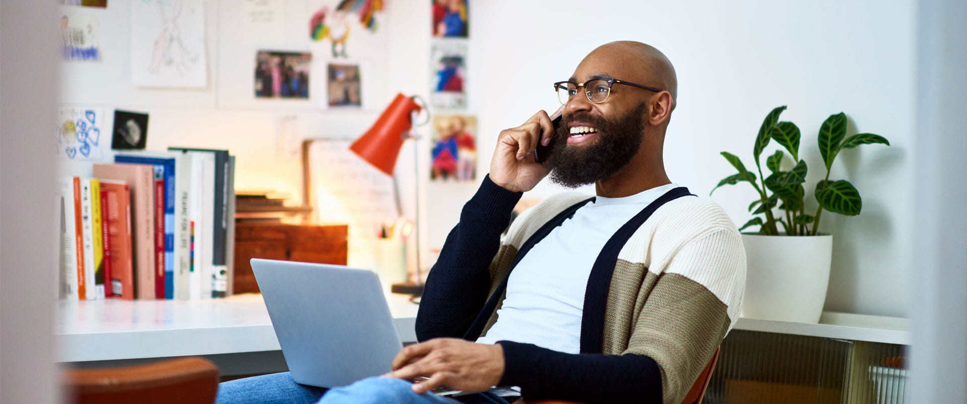 Professional consultant takes a call from favorite client thanks to the best wifi-extender he has a fast connection