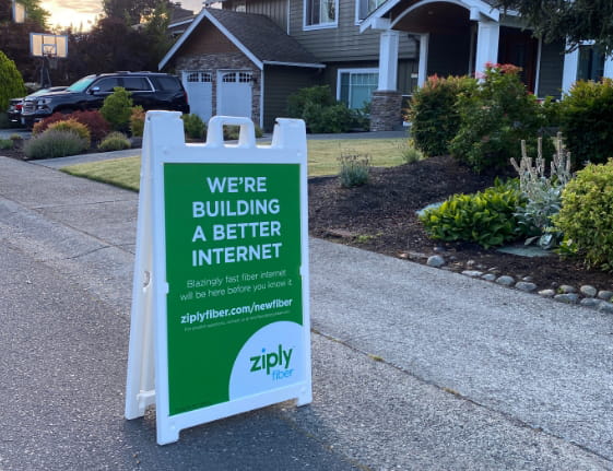 Ziply Fiber branded construction sign reading We're building a better internet 